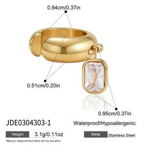Detail view of gold stainless steel ear cuff with clear zircon pendant and measurements