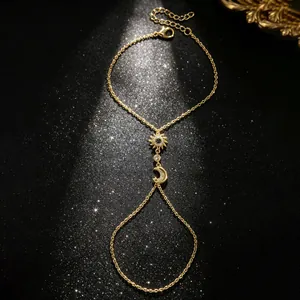 Bracelet bague élégant plaqué or avec motifs soleil et lune ornés de zircons scintillants