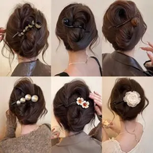 Elegant collection of six hair sticks and pins with pearls and flowers for bun hairstyles