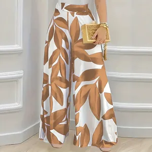 Stijlvolle broek met hoge taille en wijde pijpen met een bruin bladprint ontwerp