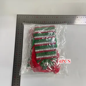 Detailed view of 4-piece Christmas elf striped chair leg covers with scale measurement