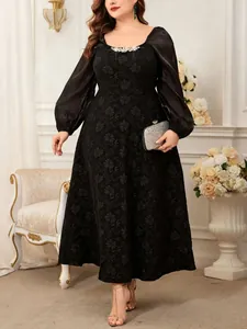 Full-body shot of an elegant plus size black jacquard dress in a luxurious indoor setting