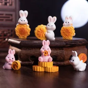 Adorable miniature rabbit figurines with mooncakes for Mid-Autumn festival desktop decor