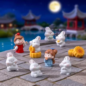 Cute Mid-Autumn Festival rabbit and fairy figurines set in a moonlit garden scene