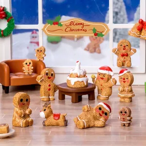 Detailed view of various cute Christmas themed gingerbread men and reindeer miniature figurines