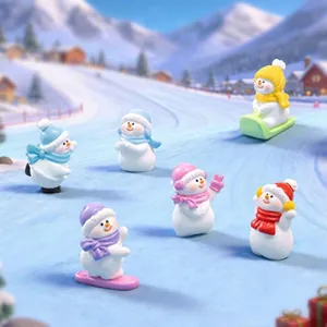 Collection of miniature snowman figurines displayed on a scenic snowy mountain background