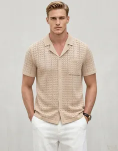 Close-up detail of men's beige Cuban collar knit polo shirt showing textured weave