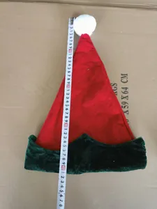Detail view showing the height measurement of a festive red and green Christmas elf hat