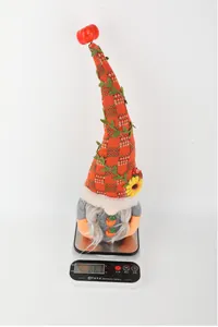 Mesure détaillée du poids d'une décoration de gnome citrouille de la moisson