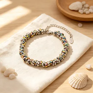 Bracelet perlé en acier inoxydable arc-en-ciel avec chaîne réglable et étiquette