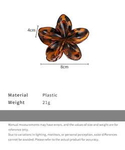 Tortoiseshell flower hair claw clip detail showing 8cm length and plastic material info