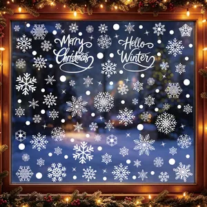 Close-up of white snowflake static window decals with festive Merry Christmas text decoration