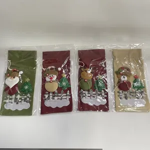 Set mit vier Weihnachts-Flaschentüten aus Sackleinen mit niedlichen Cartoon-Figuren