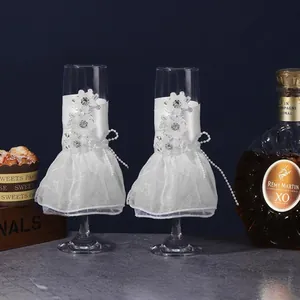 Elegant white lace dress-style champagne glass covers for wedding party table decor