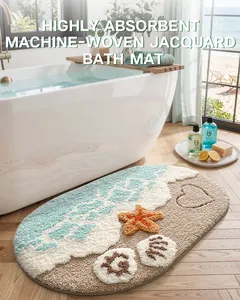 Detalle de una alfombrilla de baño de jacquard absorbente con tema de playa en un baño