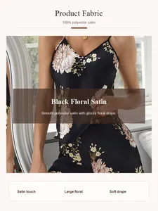 Detail view of smooth black floral polyester satin fabric for elegant women's pajama set