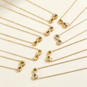 Elegant gold titanium steel infinity necklaces with sparkling crystal pavé accents.