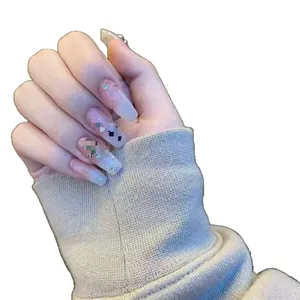 Handmade long coffin press-on nails with nude gradient and rhinestone accents