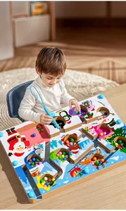 Toddler using magnetic wand to move colorful beads through a wooden animal maze toy