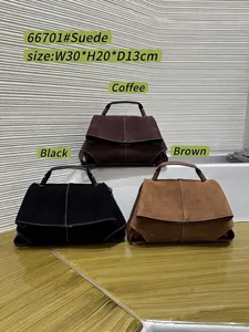 Three minimalist suede handbags in black, brown, and coffee colors for women's office commute