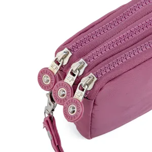 Premium purple nylon mobile phone pouch with three zippers and water-resistant fabric