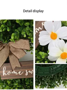 Macro detail of artificial wreath showing burlap bow and white daisy flowers