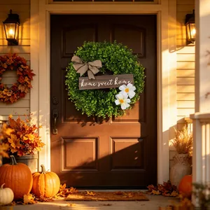 Artificial green boxwood wreath with home sweet home sign and burlap bow decoration