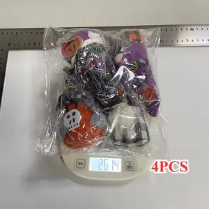 Detailed weight measurement of four Halloween gnome plush toys on a digital scale