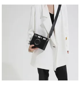 Stylish vintage camera-shaped crossbody box bag for women in sleek black leather