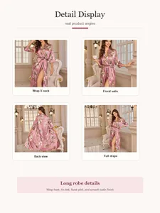 Dettagli di una vestaglia in raso a fiori rosa con scollo a V e cintura annodata