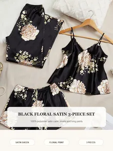Elegant black floral satin 3-piece pajama set including camisole, shorts, and pants.