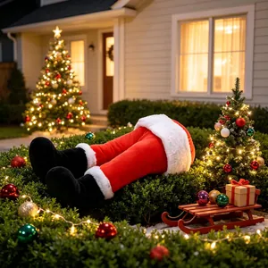 Creative plush Santa Claus legs decoration stuck in bush for Christmas outdoor decor