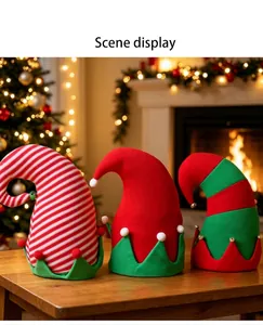 Detailed view of festive Christmas elf hats with bells in red and green stripes scene.