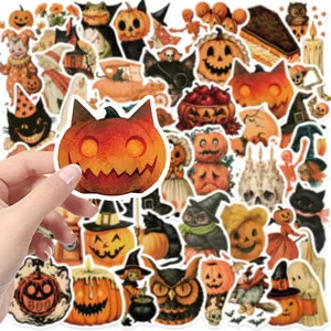 Vintage Halloween sticker collection featuring a cat-shaped pumpkin held by hand