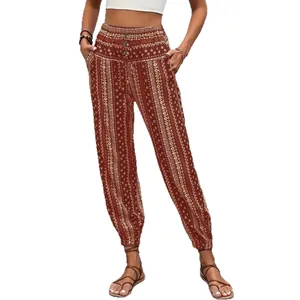 Pantalones bombachos bohemios con estampado étnico, cintura elástica y puños ajustados
