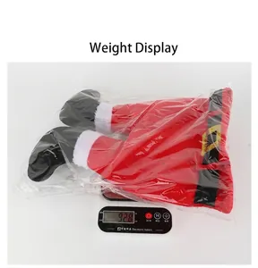 Detailed view showing the 92.8g weight of Christmas red elf legs tree decoration