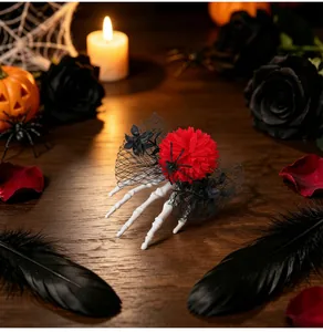 Detailed view of Halloween skeleton hand hair clip with red flower in spooky setting.