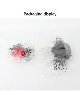 Detailed view of Halloween ghost hand flower hair clips in transparent packaging