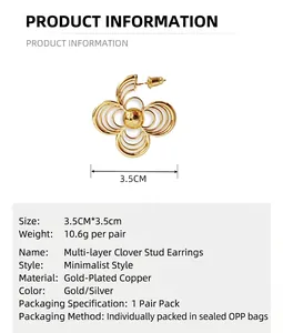 Detailed view of fashionable gold hollow layered clover stud earrings, size 3.5cm.