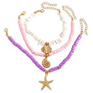 Boho gelaagde enkelbandjes set met kleurrijke kralen en gouden schelp- en zeesterhangers