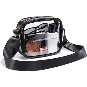 Detail view of a clear PVC crossbody bag with waterproof design for travel storage