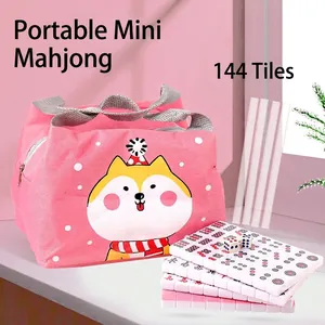 Tragbares Mini-Mahjong-Set mit 144 Steinen und Cartoon-Hunde-Aufbewahrungstasche