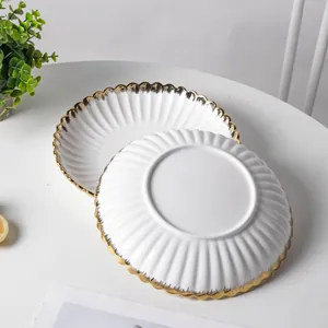 Elegant European style white ceramic dining plate with scalloped gold rim for western food