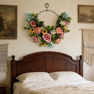Detailed view of a colorful artificial floral wreath with roses hanging on a bedroom wall