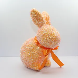 Dekorative orange glitzernde Osterhasenfigur mit Satinschleife für Heimpartys, 23,5 cm hoch