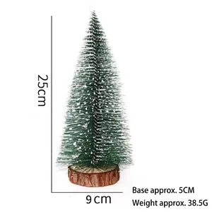 Miniature 25cm green Christmas tree decorated with white snow and natural wood base