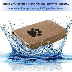 Quick-drying brown microfiber pet towel with paw print design shown in splashing water