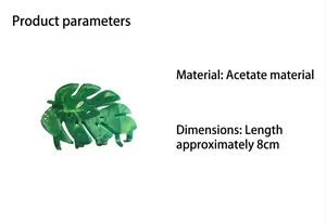 Detail view of a green monstera leaf hair claw made of premium acetate material.