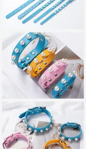Detail of PU leather pet collar with pearl and rivet decorations in multiple colors.