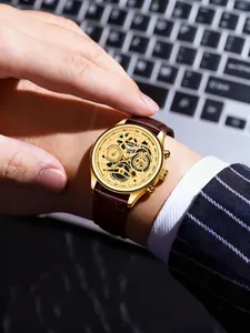 Close-up of WOKAI men's quartz sport watch with gold case and brown leather strap